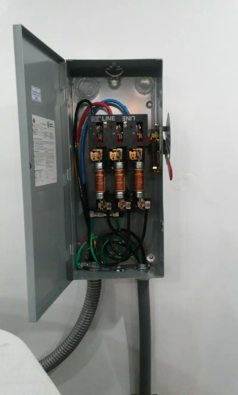 Three-phase disconnect switch installed for Smoke Detector Installation in Eliot